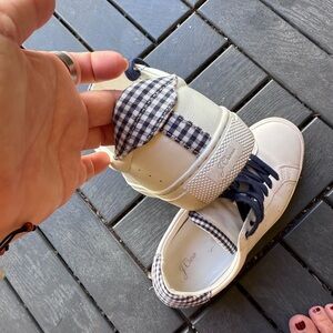 J. Crew Saturday sneakers in white leather with gingham detail.
